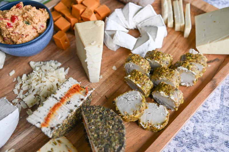 cheeses on a cheese board