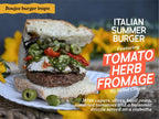 Italian summer burger with tomato herb fromage on a plate, surrounded by yellow flowers.