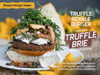 Truffle Royale Burger with truffle brie, sautéed mushrooms, and arugula on a ciabatta bun.