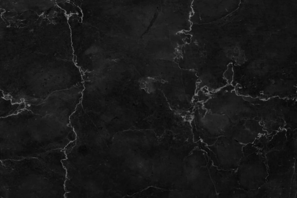 Dark marble texture with gray veins